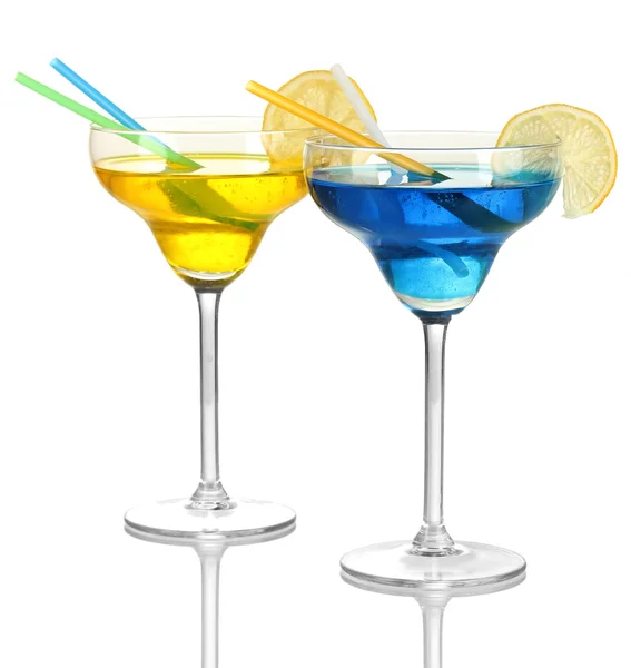 Yellow and blue cocktails in glasses isolated on white — Stock Photo, Image