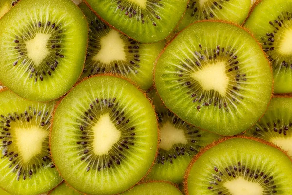 Kiwi segmenten achtergrond — Stockfoto