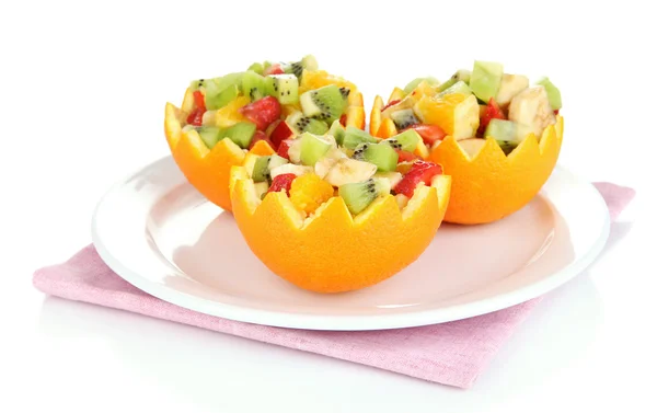 Fruit salad in hollowed-out orange isolated on white — Stock Photo, Image