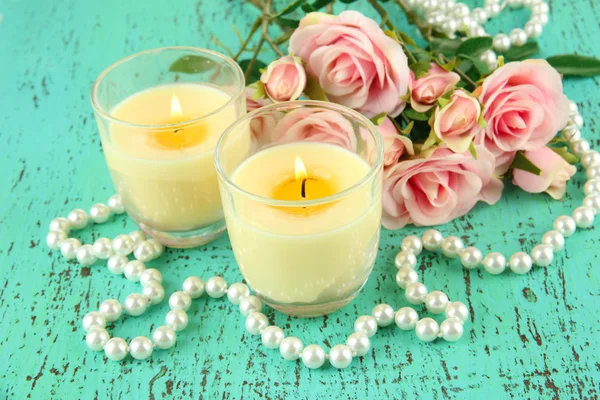 Candles on wooden table close-up — Stock Photo, Image