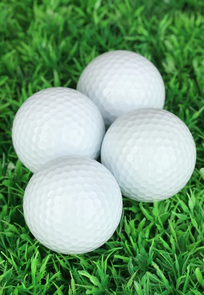 Golf balls on grass close up — Stock Photo, Image