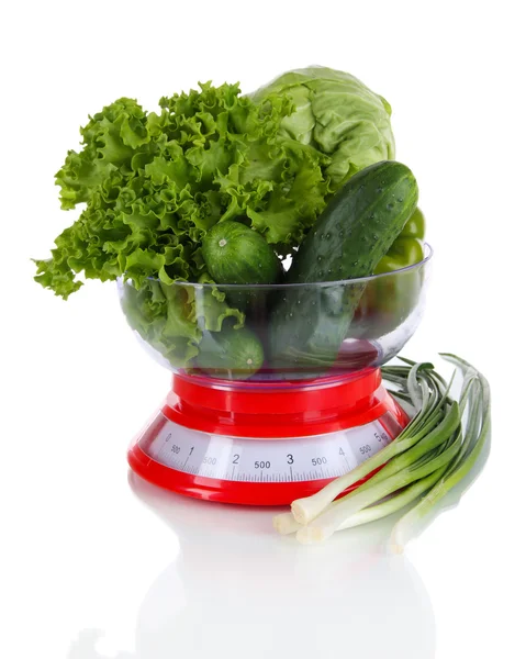 Fresh vegetables in scales isolated on white — Stock Photo, Image