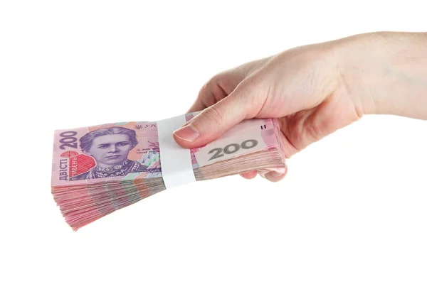 Українські гроші в руці, ізольовані на білому — стокове фото