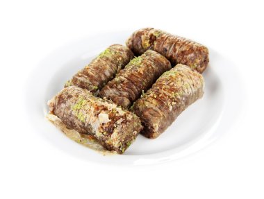 plaka üzerinde beyaz izole tatlı baklava