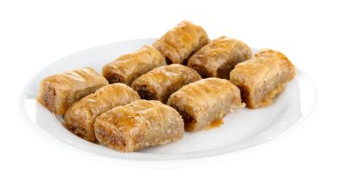 plaka üzerinde beyaz izole tatlı baklava