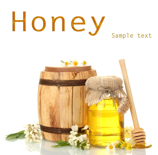 Honey in bank and barrel isolated on white — Stock Photo, Image