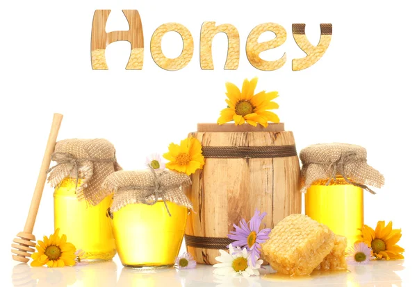 Honey in banks and barrel isolated on white — Stock Photo, Image