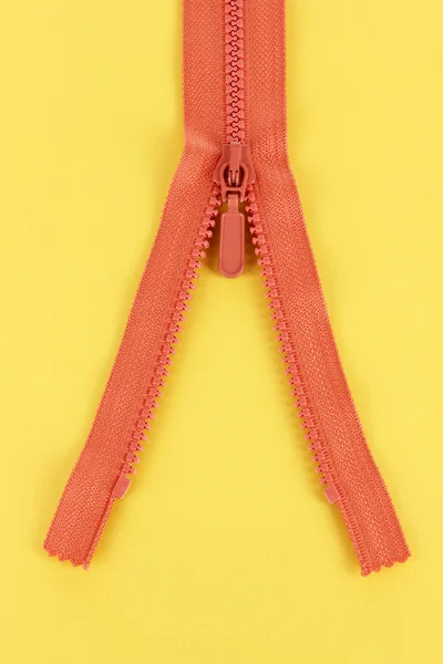 Zipper on yellow background — Stock Photo, Image