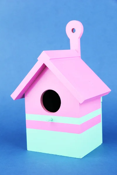 Decorative nesting box on color background — Stock Photo, Image