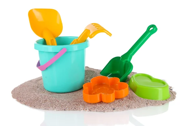 Children's toys on sand isolated on white — Stock Photo, Image