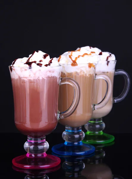 Layered coffee in glass on table on grey background — Stock Photo, Image