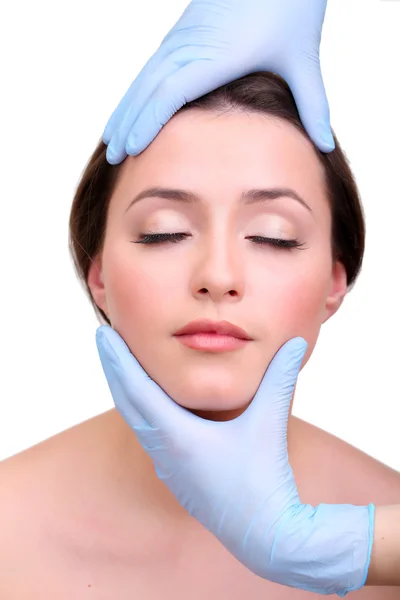 Rubber gloves touching face of young woman close up — Stock Photo, Image