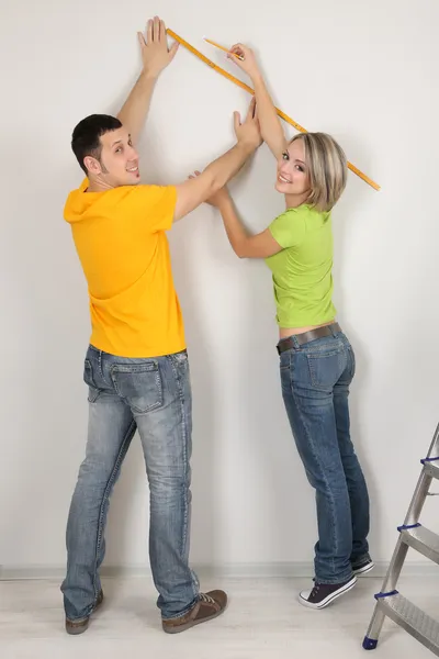 Young couple moving in new house Stock Image