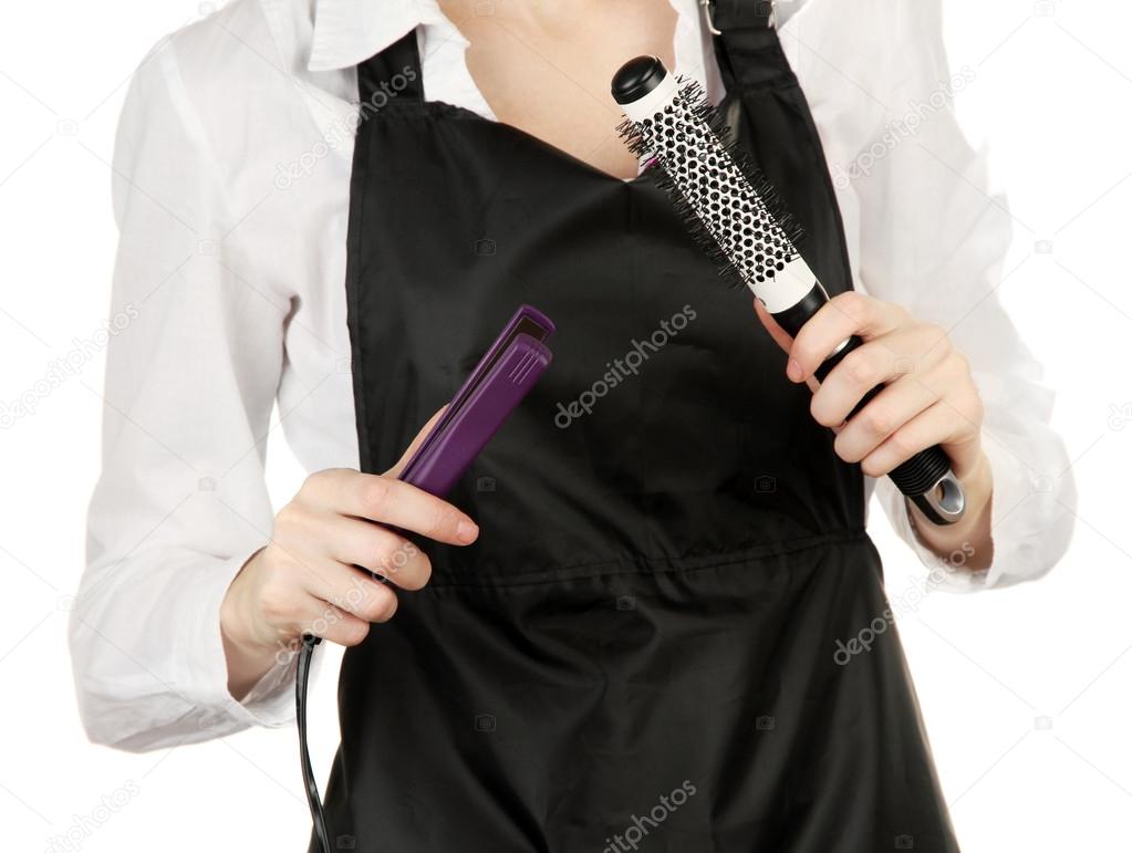 Hairdresser in uniform with working tools, isolated on white