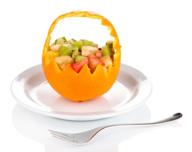 Fruit salad in hollowed-out orange isolated on white clipart