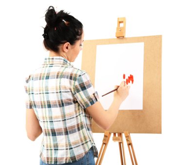güzel bir genç kadın ressam üzerine beyaz izole iş başında