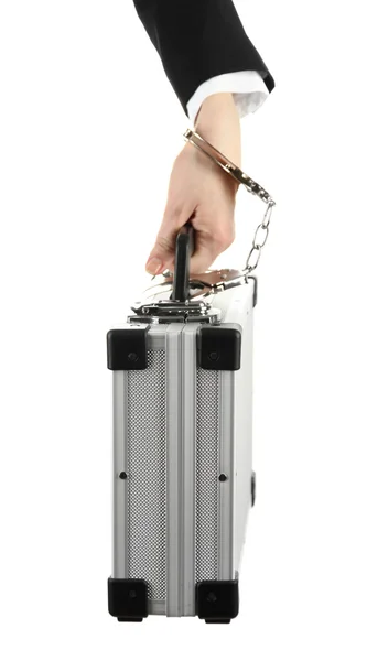 Рука с наручниками и чемоданом, изолированные на белом — стоковое фото