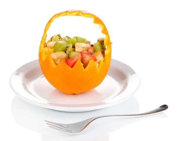 Fruit salad in hollowed-out orange isolated on white — Stock Photo, Image