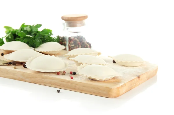 Raw dumplings and ingredients on wooden desk, isolated on white — Stock Photo, Image