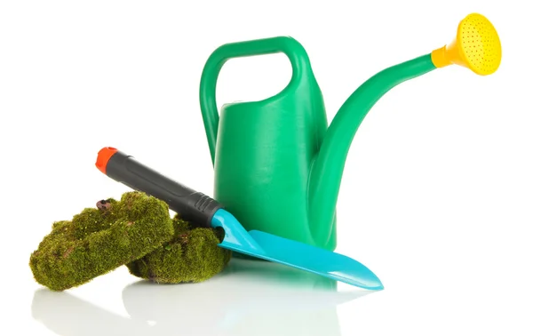 Green watering can with gardener accessories isolated on white — Stock Photo, Image