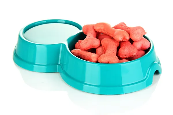 Dry dog treats in bowl isolated on white — Stock Photo, Image