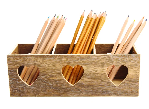 Verschillende potloden in houten kist, geïsoleerd op wit — Stockfoto