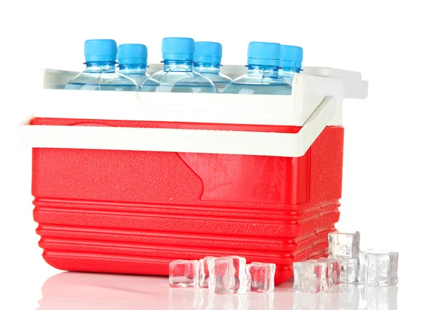 Traveling refrigerator with bottles of water and ice cubes, isolated on white — Stock Photo, Image