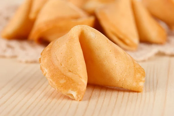 Fortune cookies on wooden table — Stock Photo, Image