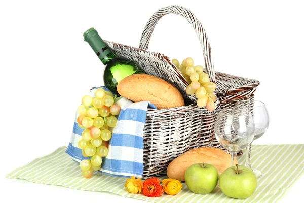 Picnic basket with fruits and bottle of wine, isolated on white — Stock Photo, Image