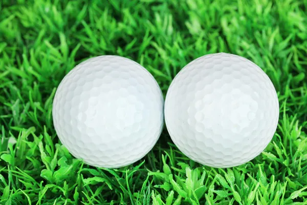 Golf balls on grass close up — Stock Photo, Image