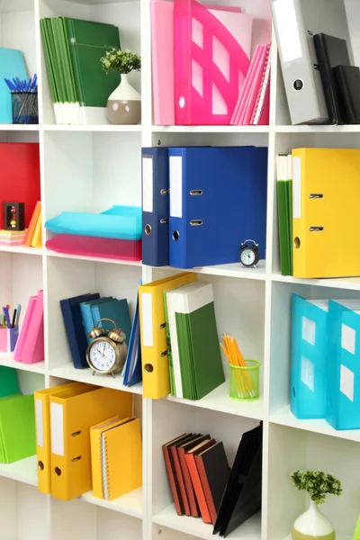 White office shelves with different stationery, close up — Stock Photo, Image