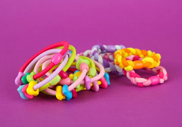 Scrunchies på rosa bakgrund — Stockfoto