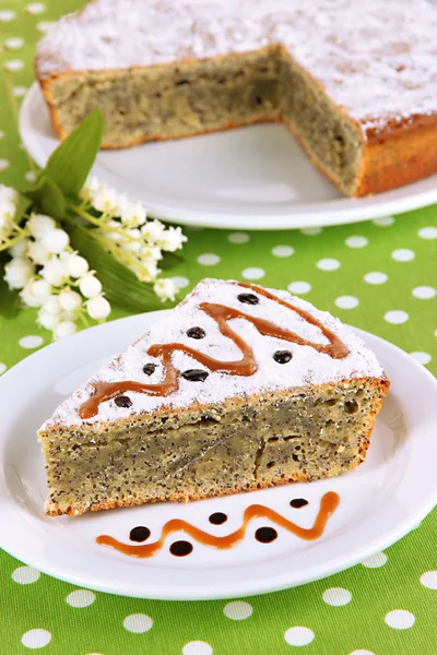 Delicious poppy seed cake on table close-up — Stock Photo, Image