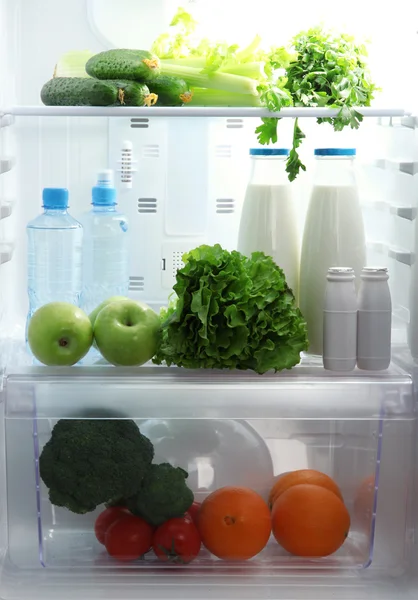 Open refrigerator with vegetarian food — Stock Photo, Image