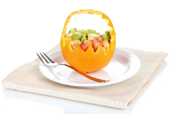 Fruit salad in hollowed-out orange isolated on white — Stock Photo, Image