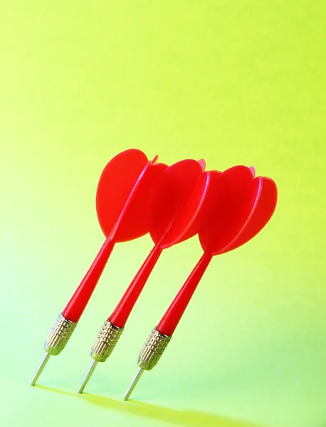 Darts on green background — Stock Photo, Image