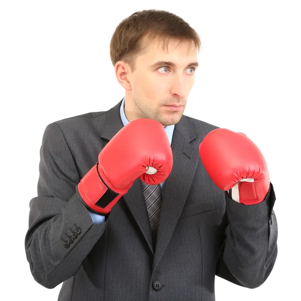 Hombre de negocios en guantes de boxeo aislados en blanco — Foto de Stock