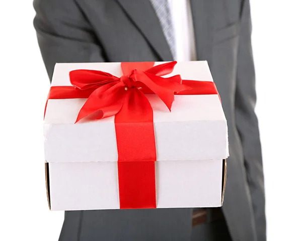 Young businessman present gift box, isolated on white — Stock Photo, Image