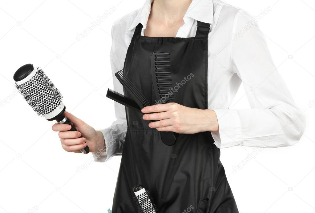 Hairdresser in uniform with working tools, isolated on white