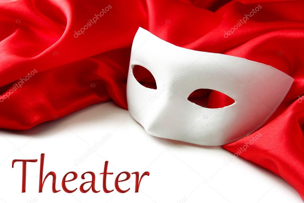 White mask and red silk fabric, isolated on white