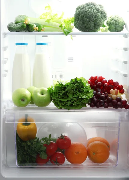 Open refrigerator with vegetarian food — Stock Photo, Image