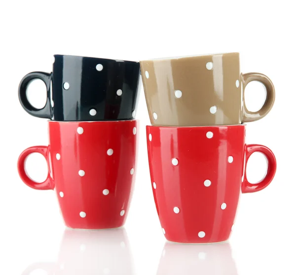 Four cups of polka dot isolated on white — Stock Photo, Image