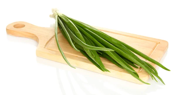 Green onion on wooden cutting board isolated on white — Stock Photo, Image