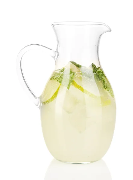 Lemonade in pitcher isolated on white — Stock Photo, Image