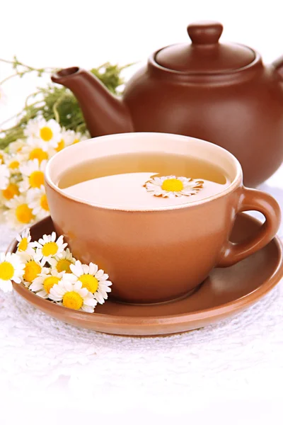 Cup of herbal tea with camomiles close up — Stock Photo, Image