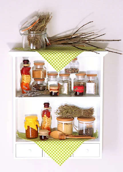 Variety spices on kitchen shelves — Stock Photo, Image