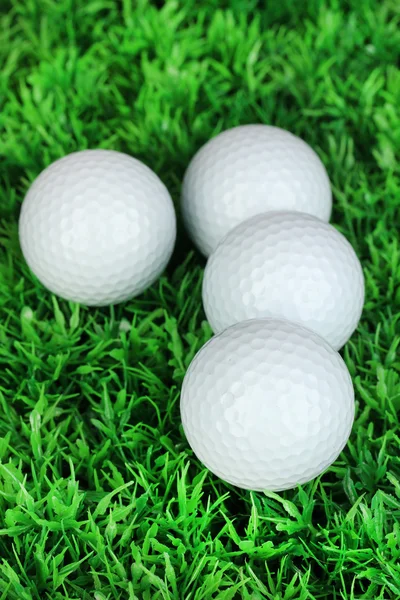 Golf balls on grass close up — Stock Photo, Image