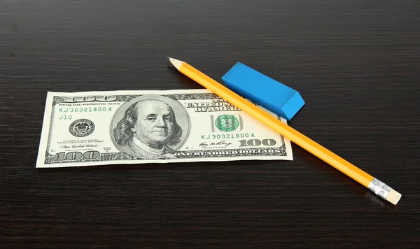 Making fake dollar on wooden background — Stock Photo, Image