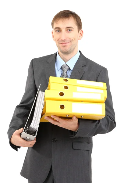 Молодой бизнесмен с изолированными папками — стоковое фото