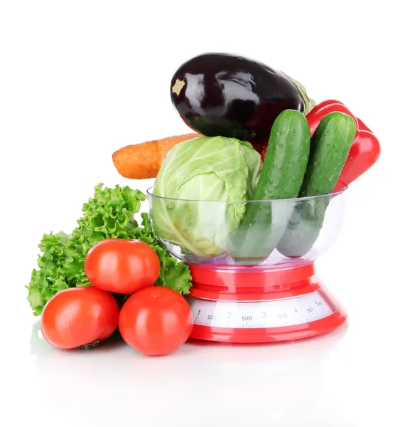 Fresh vegetables in scales isolated on white — Stock Photo, Image